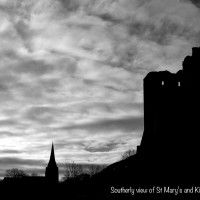 Church and Castle Looking south with St Mary's Church and Kidwelly Castle in silhouette.