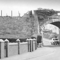 As Was! Tycoch Railway Bridge, Kidwelly before the demolition, Tycoch Cottages can be seen on the left, the road is now called Pembrey Road.