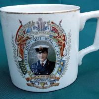Souvenir Cup A commemorative Cup produced by Sir Alfred Stephens for 1911 Investiture of Edward Prince of Wales, front view.