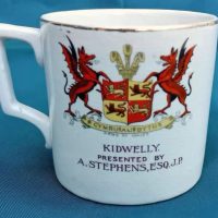 Sovenier Cup The rear of the cup produced by Sir Alfred Stephens for the 1911 investiture of Edward Price of Wales at Caernarfon Castle.